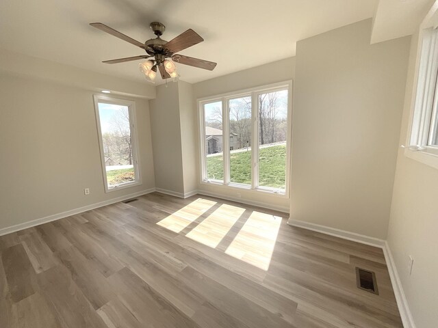 250 Sun Hill Cir, Cadiz, KY 42211 - unfurnished room with visible vents, baseboards, and wood finished floors