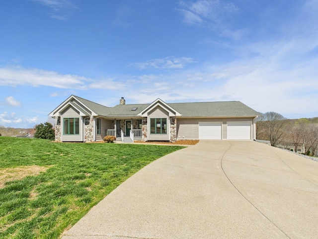 250 Sun Hill Cir, Cadiz, KY 42211 - view of front of house featuring a front yard, stone siding, covered porch, a garage, and concrete driveway