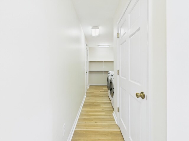 250 Sun Hill Cir, Cadiz, KY 42211 - hallway featuring light wood-style floors, baseboards, and washing machine and clothes dryer