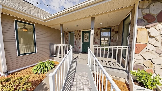 250 Sun Hill Cir, Cadiz, KY 42211 - doorway to property featuring a porch, a shingled roof, and stone siding