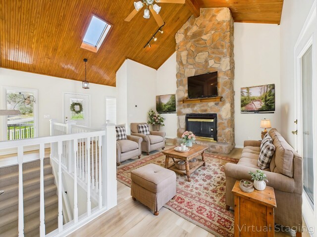 250 Sun Hill Cir, Cadiz, KY 42211 - living area featuring high vaulted ceiling, a ceiling fan, wood ceiling, wood finished floors, and a skylight