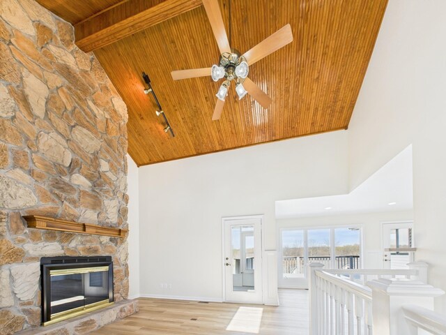 250 Sun Hill Cir, Cadiz, KY 42211 - unfurnished living room featuring high vaulted ceiling, ceiling fan, rail lighting, wood ceiling, and wood finished floors