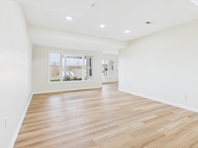 250 Sun Hill Cir, Cadiz, KY 42211 - unfurnished living room featuring visible vents, baseboards, recessed lighting, and light wood finished floors