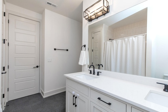 3509B Wrenwood Ave, Nashville, TN 37205 - bathroom featuring a sink, visible vents, baseboards, and double vanity