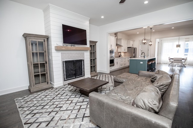3509B Wrenwood Ave, Nashville, TN 37205 - living room with ceiling fan, a fireplace, recessed lighting, baseboards, and dark wood-style floors