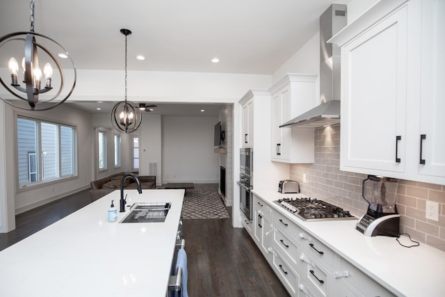 3509B Wrenwood Ave, Nashville, TN 37205 - kitchen with a notable chandelier, wall chimney range hood, open floor plan, stainless steel appliances, and a sink