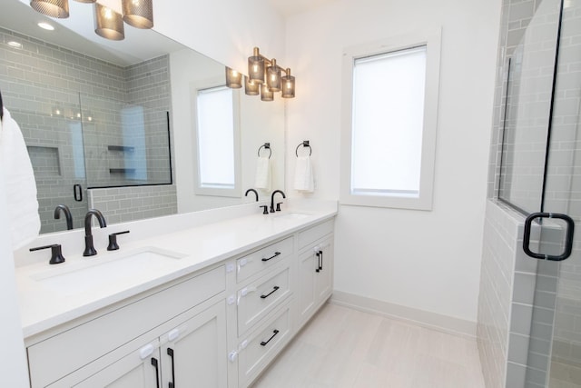 3509B Wrenwood Ave, Nashville, TN 37205 - full bathroom featuring a shower stall, double vanity, a sink, and baseboards