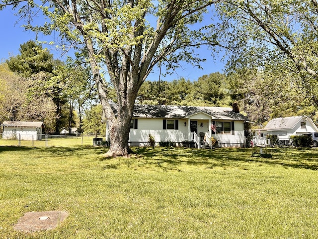 1112 Cumberland St, Decherd, TN 37324 - exterior space featuring fence and a front yard