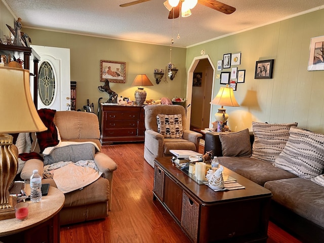 1112 Cumberland St, Decherd, TN 37324 - living room with wood finished floors, a textured ceiling, crown molding, and ceiling fan