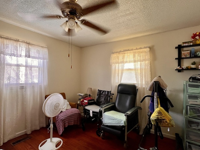 1112 Cumberland St, Decherd, TN 37324 - living area featuring ceiling fan, wood finished floors, visible vents, and a textured ceiling