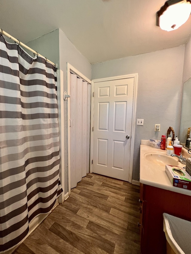 1112 Cumberland St, Decherd, TN 37324 - full bathroom featuring wood finished floors and vanity