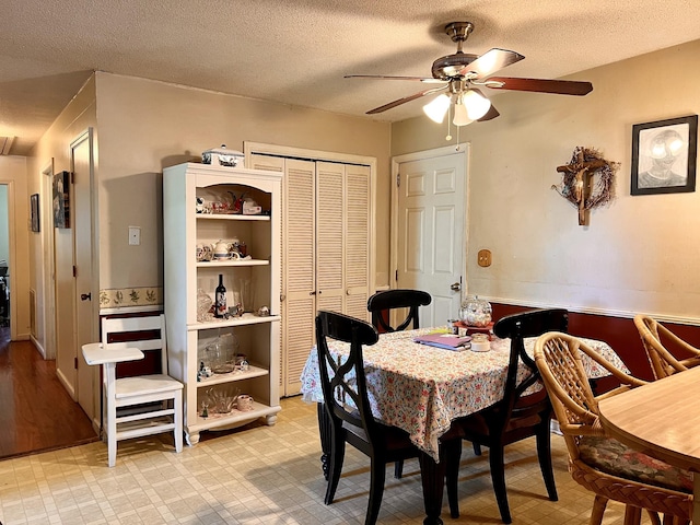 1112 Cumberland St, Decherd, TN 37324 - dining space featuring a textured ceiling, ceiling fan, and light floors