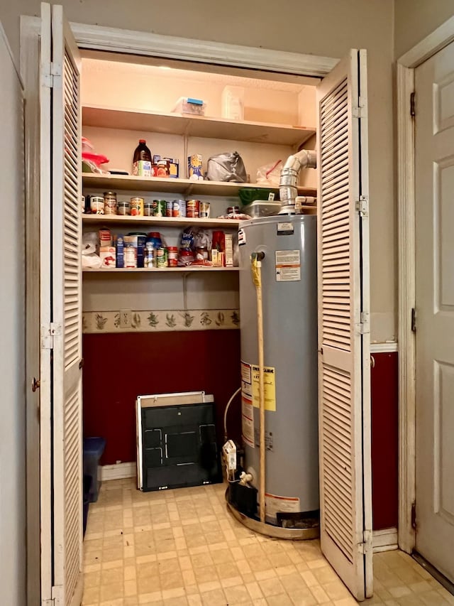 1112 Cumberland St, Decherd, TN 37324 - utility room featuring gas water heater