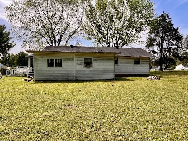 1112 Cumberland St, Decherd, TN 37324 - rear view of property featuring cooling unit and a yard