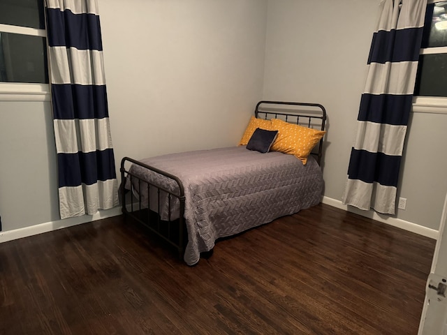1001 N Graycroft Ave, Madison, TN 37115 - bedroom featuring baseboards and wood finished floors