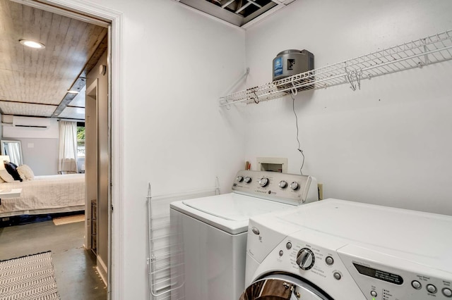 1001 N Graycroft Ave, Madison, TN 37115 - laundry area with laundry area, a wall mounted air conditioner, and washing machine and dryer