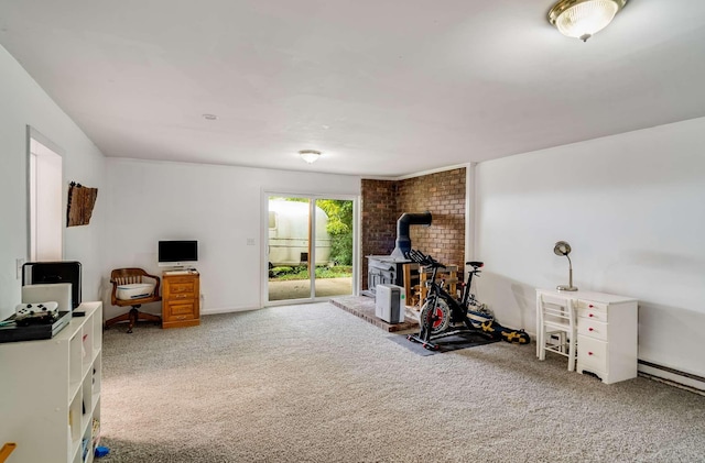 1001 N Graycroft Ave, Madison, TN 37115 - workout room with a wood stove and carpet