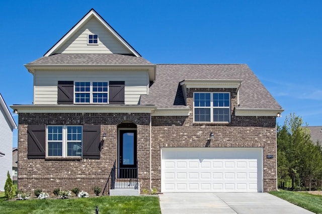 view of front of house featuring roof with shingles, concrete driveway, and brick siding