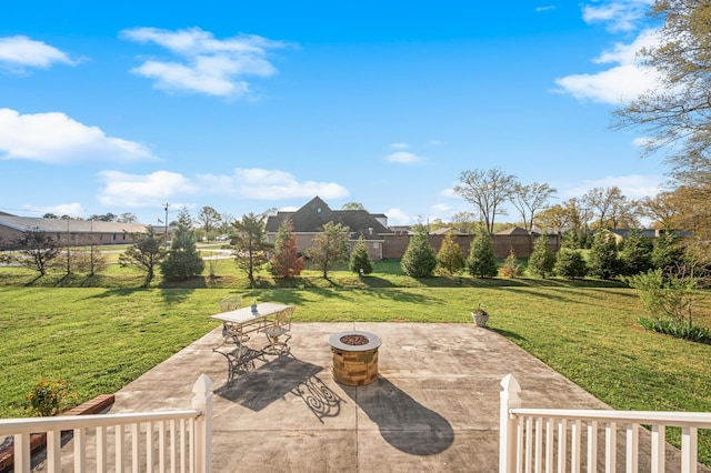 view of patio featuring a fire pit