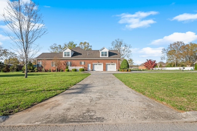 cape cod-style house featuring concrete driveway, brick siding, and a front lawn