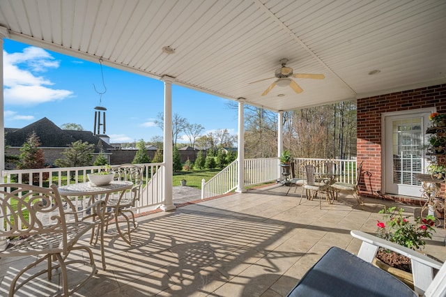view of patio / terrace featuring ceiling fan