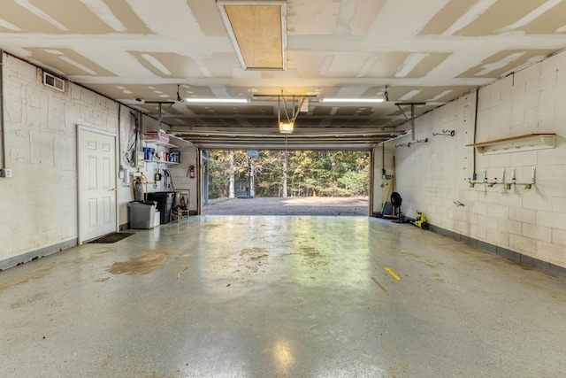 7274 Kingston Rd, Fairview, TN 37062 - garage with concrete block wall and visible vents