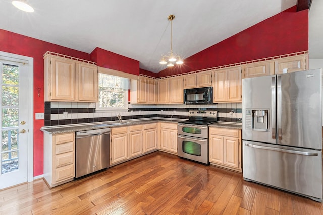 7274 Kingston Rd, Fairview, TN 37062 - kitchen with hardwood / wood-style flooring, light brown cabinetry, and appliances with stainless steel finishes
