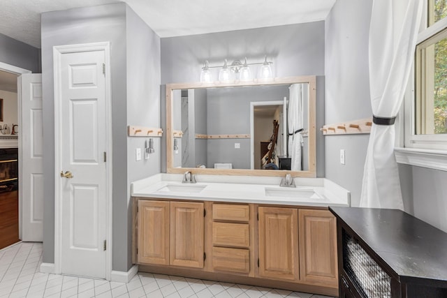 7274 Kingston Rd, Fairview, TN 37062 - bathroom with tile patterned floors, a sink, a closet, and double vanity