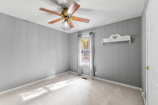 7274 Kingston Rd, Fairview, TN 37062 - carpeted spare room featuring baseboards, visible vents, ceiling fan, and a wall mounted air conditioner