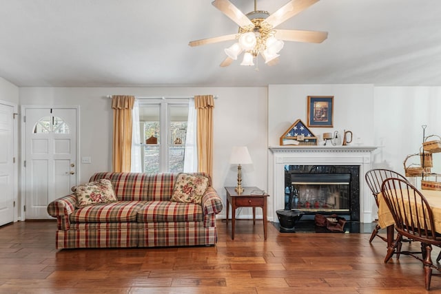 7274 Kingston Rd, Fairview, TN 37062 - living area featuring hardwood / wood-style floors, a premium fireplace, and a ceiling fan