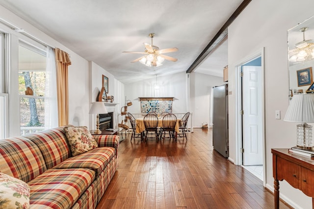 7274 Kingston Rd, Fairview, TN 37062 - living room with hardwood / wood-style floors, vaulted ceiling with beams, baseboards, a glass covered fireplace, and ceiling fan