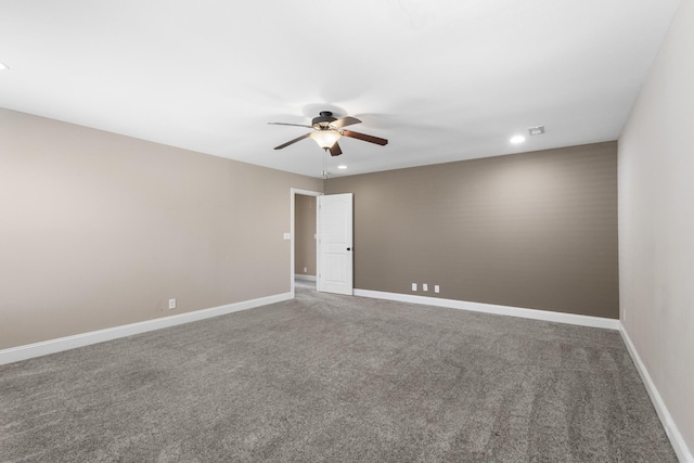 empty room featuring baseboards, a ceiling fan, carpet, and recessed lighting