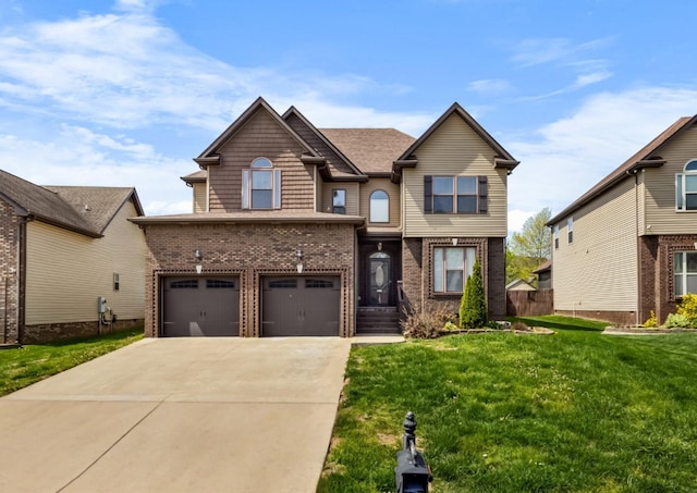 craftsman house with brick siding, driveway, an attached garage, and a front lawn