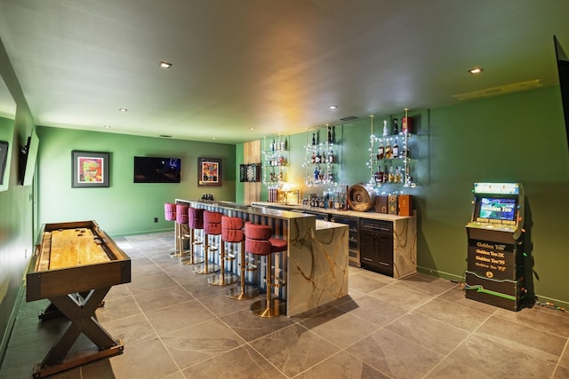 274 Callis Rd, Lebanon, TN 37090 - bar with light tile patterned floors, recessed lighting, and indoor wet bar