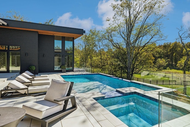 274 Callis Rd, Lebanon, TN 37090 - view of swimming pool with a patio, a pool with connected hot tub, and fence