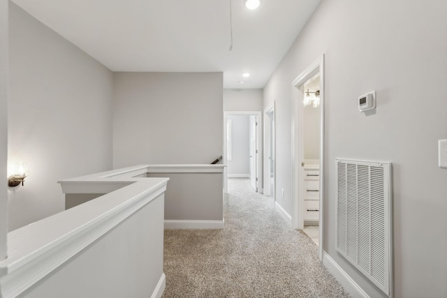 560 Twyla Dr, Lebanon, TN 37087 - hall with an upstairs landing, a heating unit, light carpet, and recessed lighting