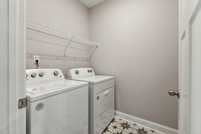 560 Twyla Dr, Lebanon, TN 37087 - laundry area with washer and dryer and baseboards