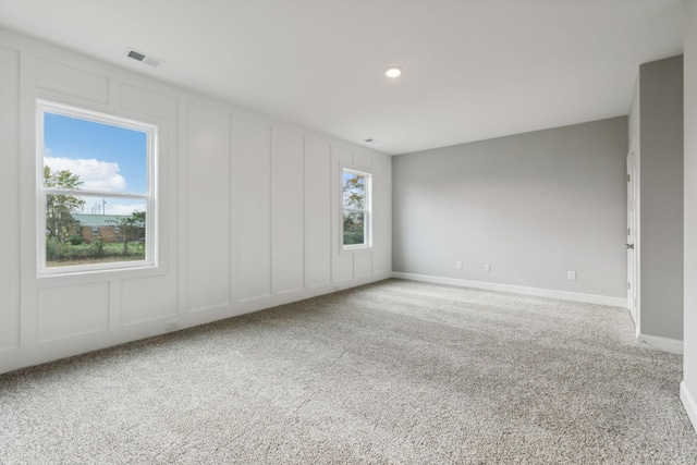 560 Twyla Dr, Lebanon, TN 37087 - unfurnished room featuring a decorative wall, carpet, and recessed lighting