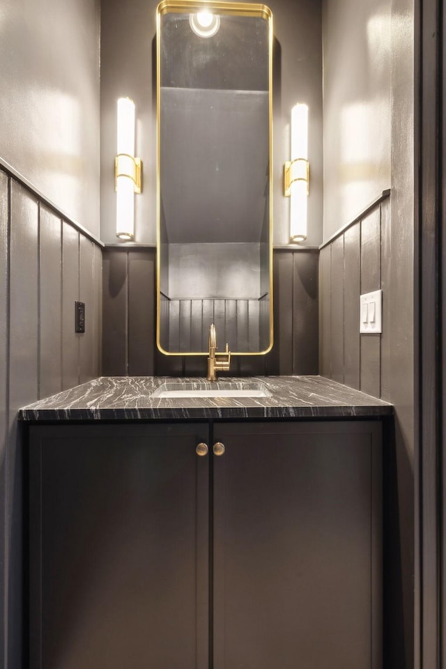 4201A Belmont Blvd, Nashville, TN 37215 - bathroom featuring a sink, a decorative wall, and wainscoting