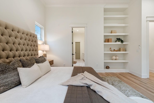 4201A Belmont Blvd, Nashville, TN 37215 - bedroom featuring ornamental molding, baseboards, and wood finished floors
