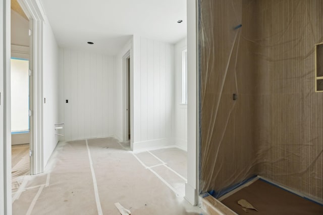 bathroom featuring a shower and a wealth of natural light