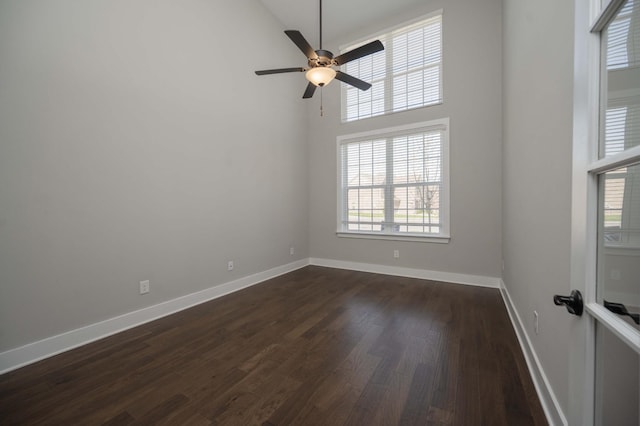 4302 Peacemill Ln, Murfreesboro, TN 37128 - spare room with dark wood finished floors, a ceiling fan, and a high ceiling