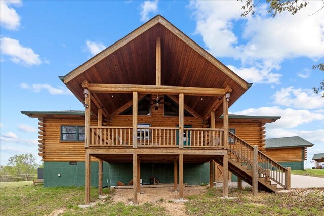 229 Blackhawk Ct, Waverly, TN 37185 - rear view of property featuring log exterior, stairs, and a deck