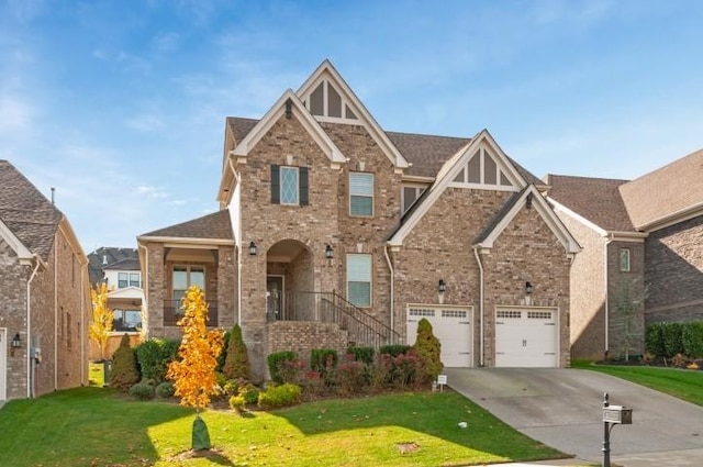 view of front of home featuring an attached garage, concrete driveway, brick siding, a front lawn, and roof with shingles