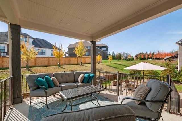 view of patio featuring a residential view, an outdoor hangout area, and fence