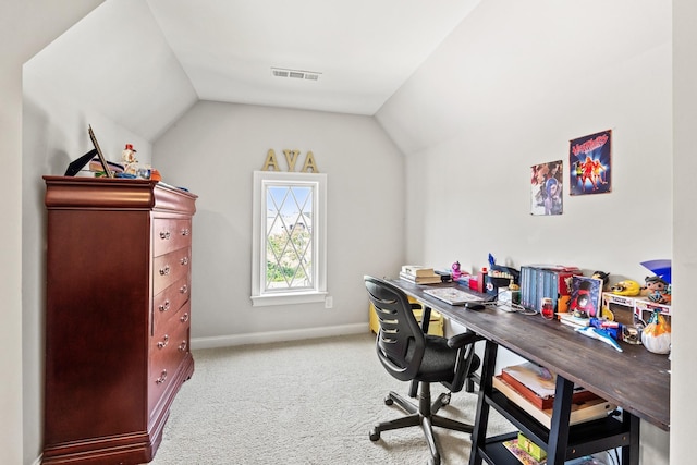 carpeted office space with visible vents, baseboards, and lofted ceiling