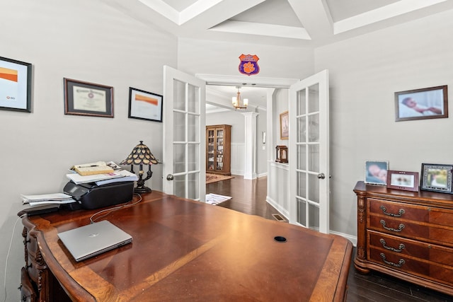 office space featuring french doors, beam ceiling, coffered ceiling, and wood finished floors