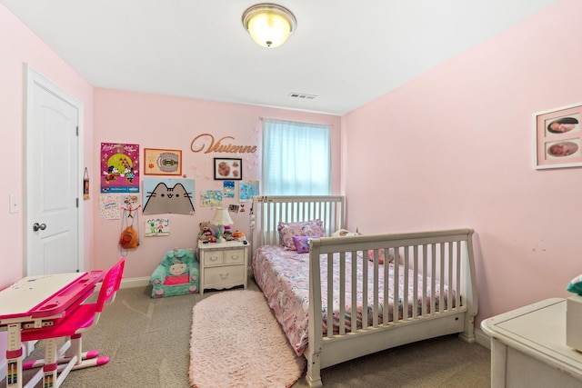 carpeted bedroom with baseboards and visible vents