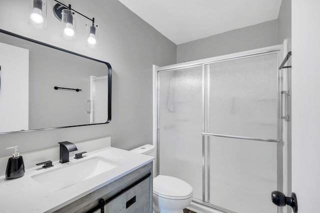 305 Thomas Ave, Hohenwald, TN 38462 - full bathroom featuring a shower stall, toilet, and vanity