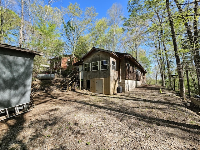 50 Deaton Ln, Parsons, TN 38363 - exterior space featuring central air condition unit and an outbuilding